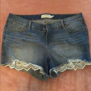 Torrid cut off shorts with lace accent